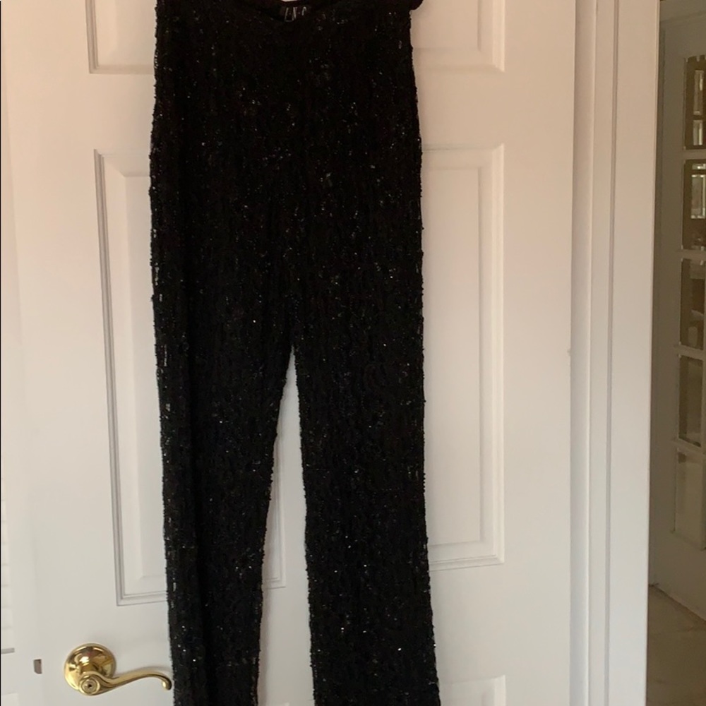 INC lined lace black pants with sequins.